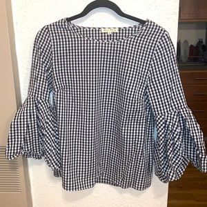 Black and white checkered bell-sleeve top